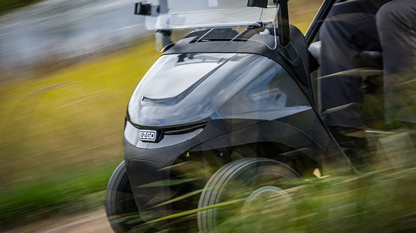 The front bumper of an E-Z-GO golf cart.