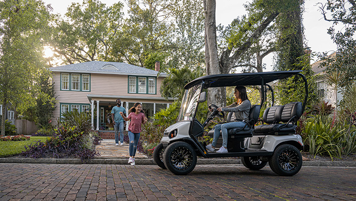 E-Z-Go Vehicle on brick street in front of house