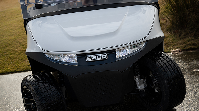 The frontend of an E-Z-GO golf cart.