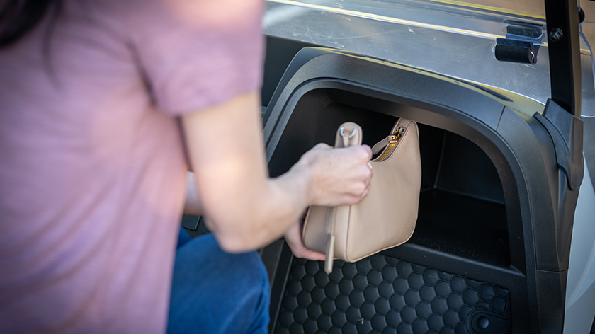 A close-up interior view of the spacious dashboard of a Valor golf cart.