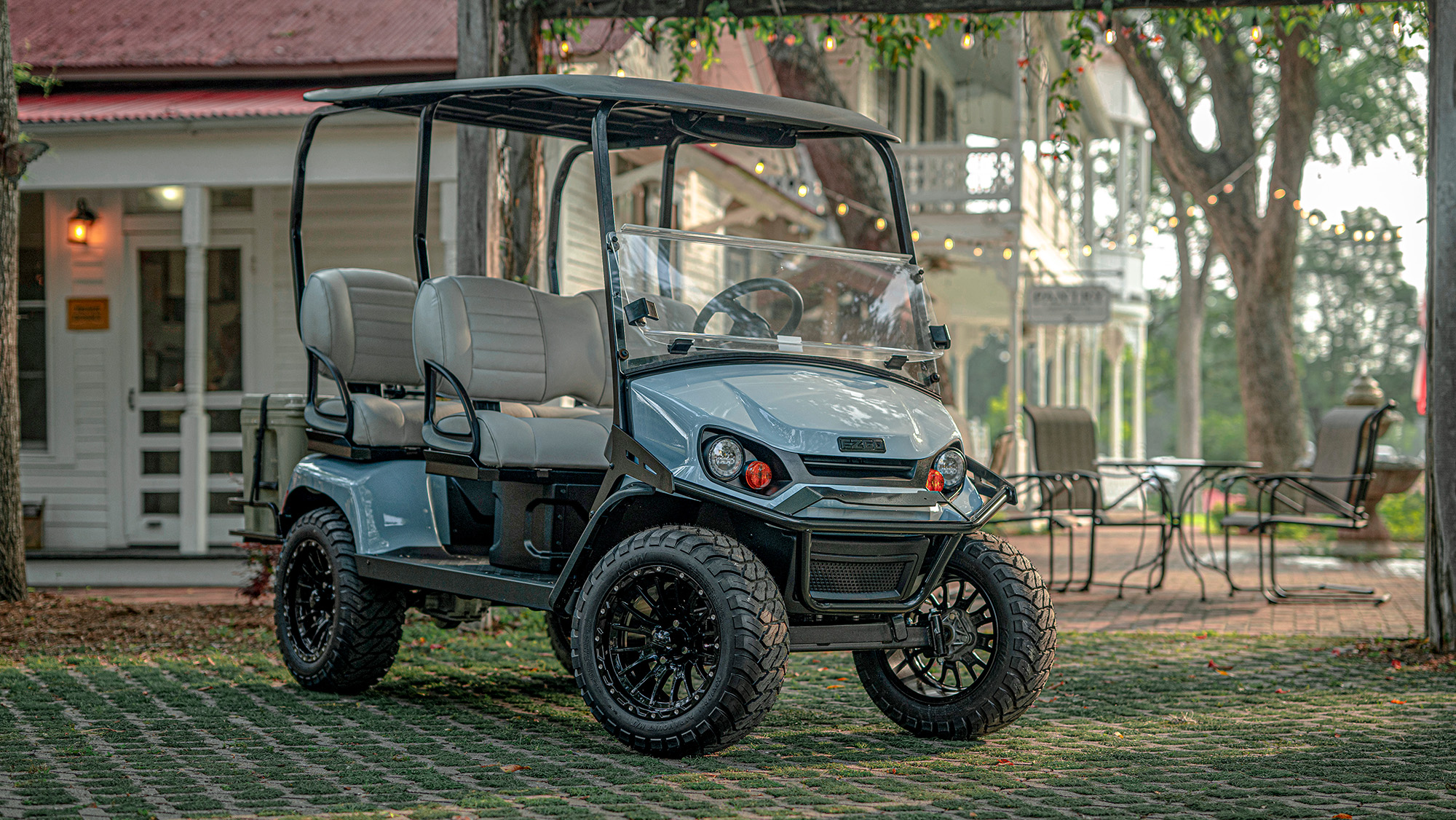 Express 6 in Ocean Grey sitting in front of a store front