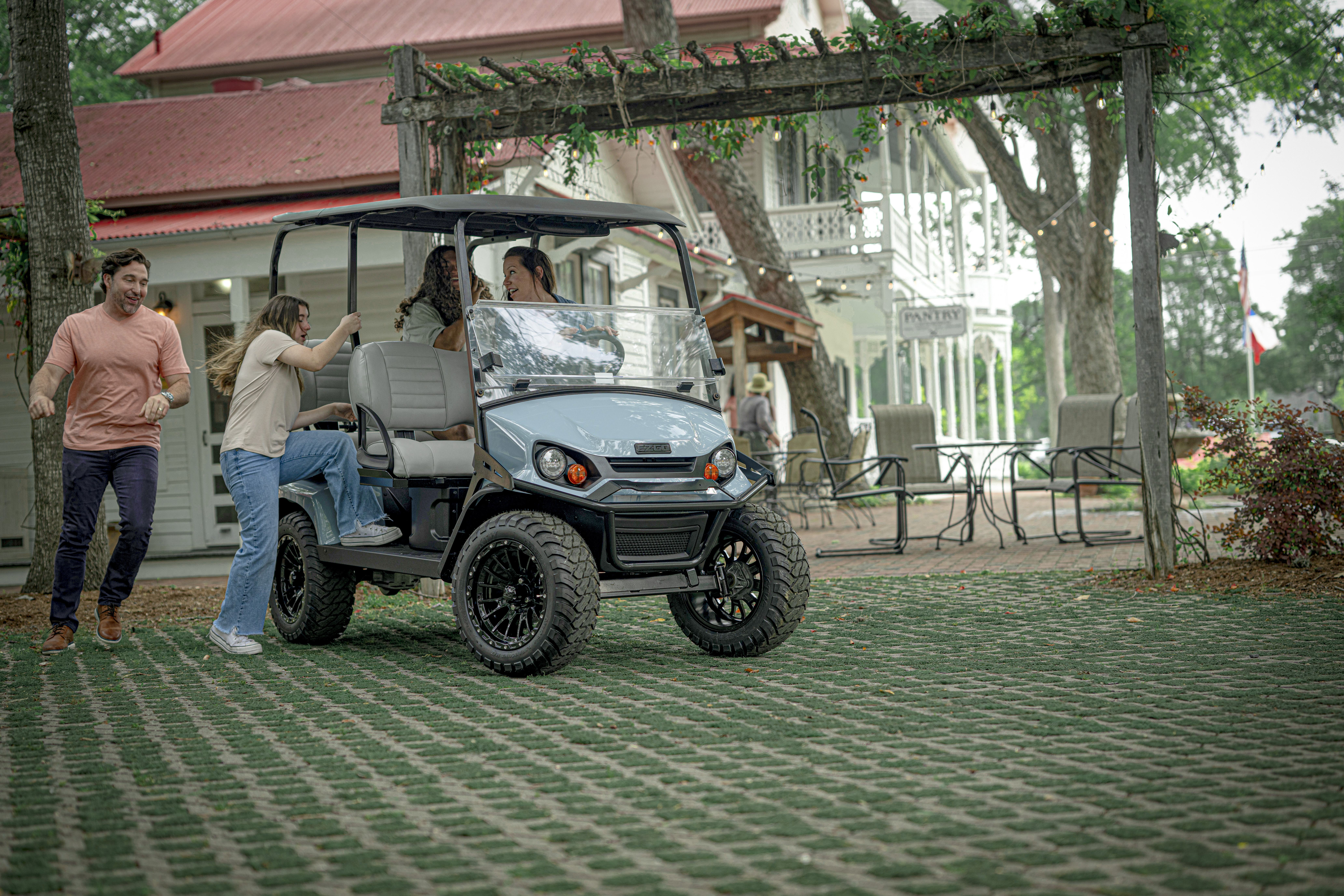 Group of friends getting into the Liberty after shopping