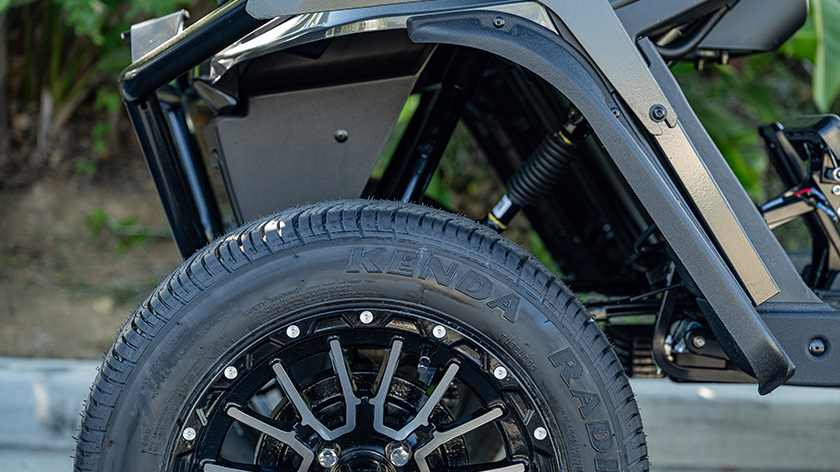 Close up of a lifted E-Z-GO vehicle