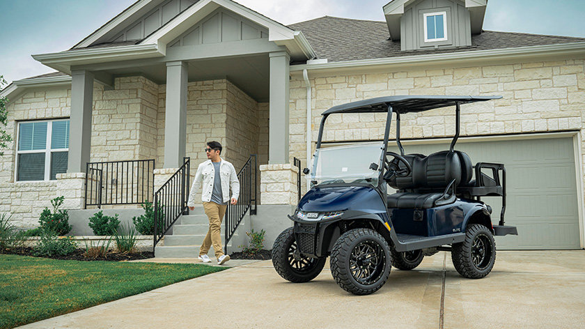 E-Z-GO RXV 4 electric and gas vehicle with two forward and two backward seats