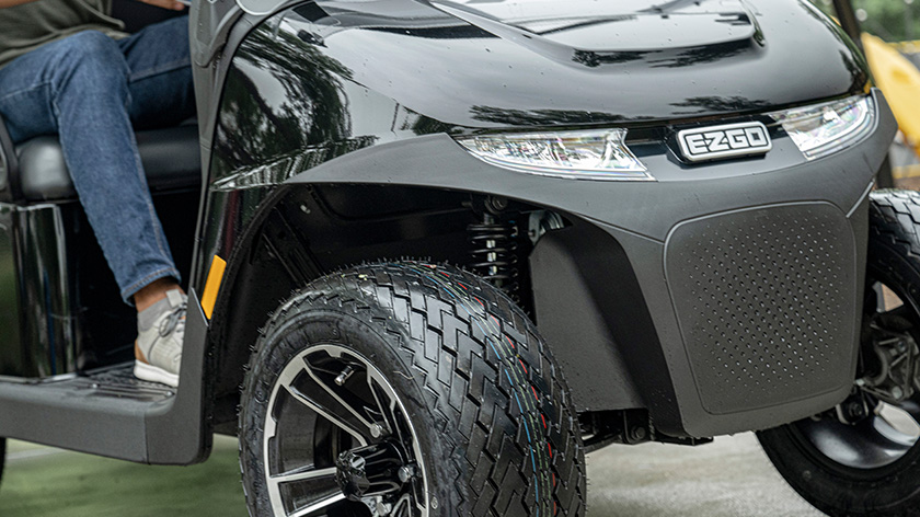 E-Z-GO RXV 4 electric and gas vehicle with two forward and two backward seats