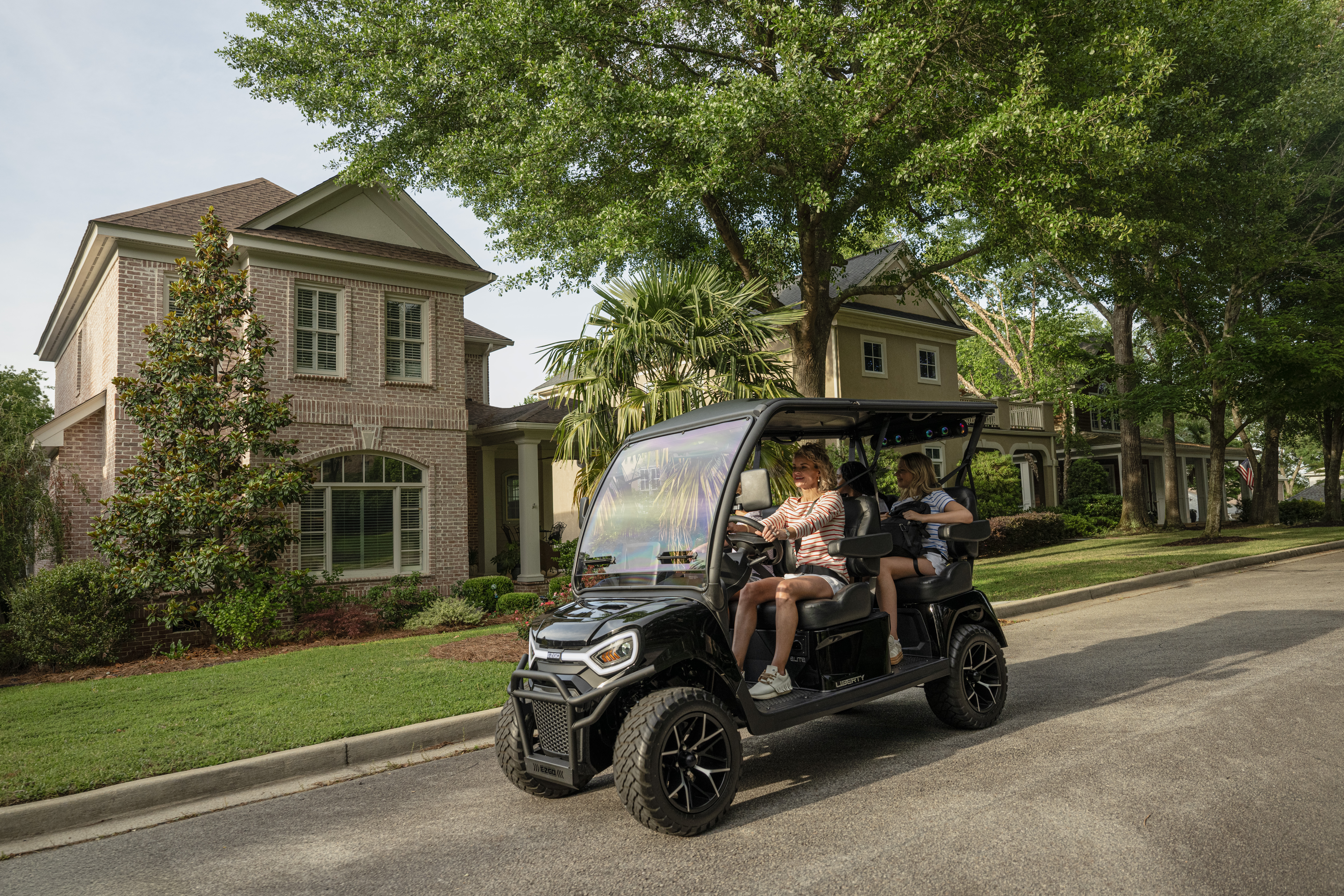 E-Z-GO Liberty 4F is a four-passenger electric golf cart with four-forward facing seats. 