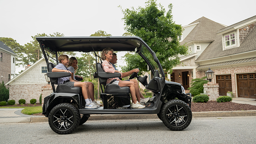 E-Z-GO Liberty 4F electric golf cart with four forward-facing seats