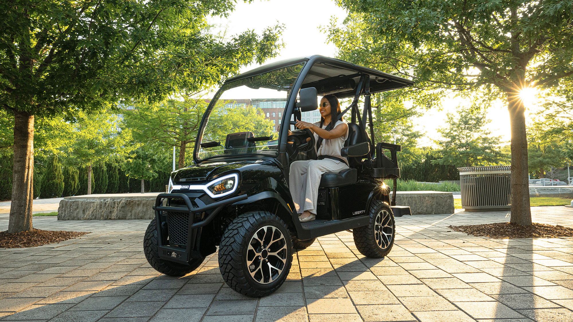 E-Z-GO Liberty 4, E-Z-GO's two forward two backward facing vehicle in gas or electric powertrain
