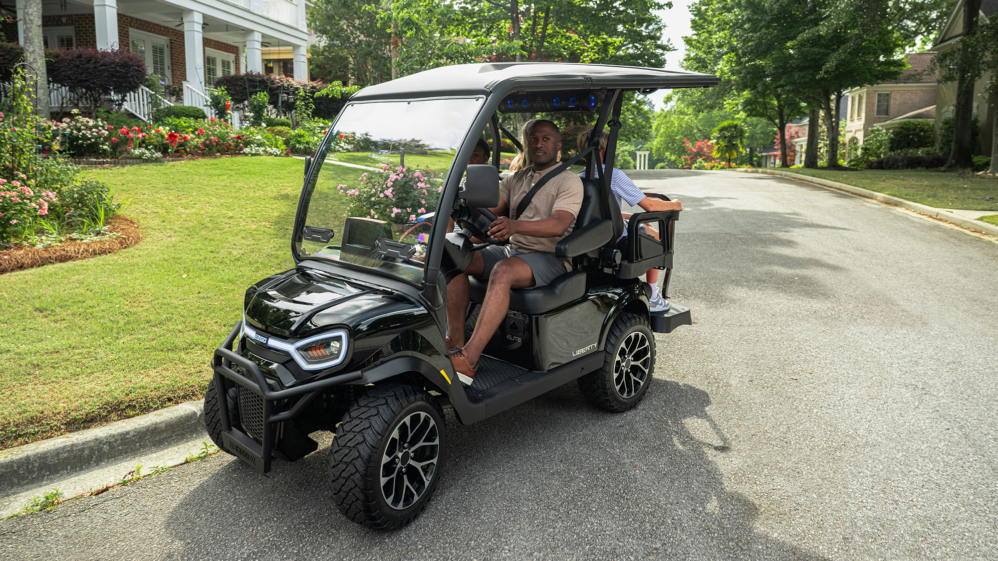 E-Z-GO Liberty 4 with 2 forward 2 backward facing seats, available in gas or electric powertrains. 